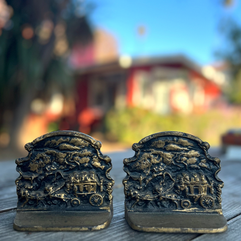 Vintage brass bookends, stagecoach scene